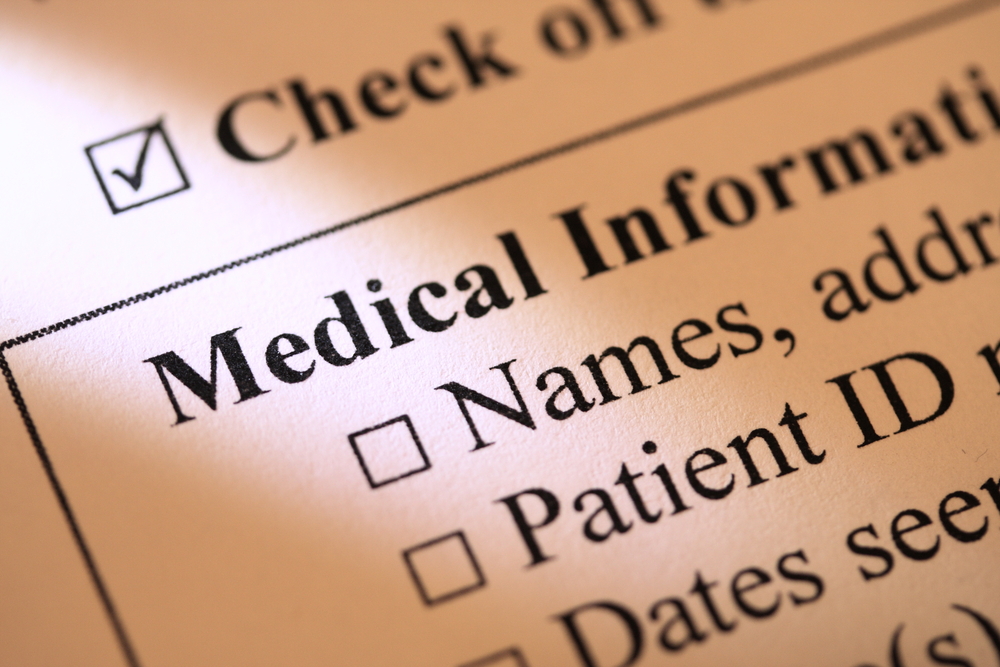 closeup of paper document with medical information questions printed on the page