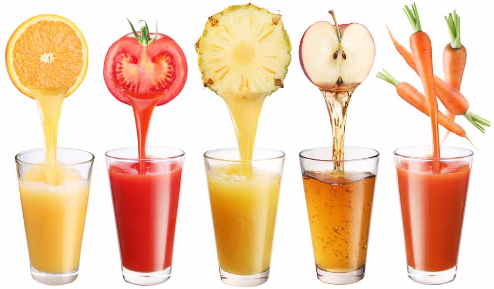 Five clear glasses filled with different juices and the fruit or vegetable about the glassed pouring in the juice