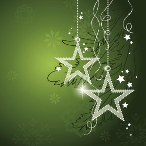 White sparkling star ornaments on silver strings with dark green background