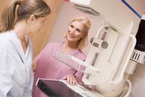 nurse and patient near mammogram machine