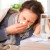 Woman sneezing and coughing with a cold of flu