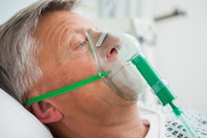 close-up of man wearing a respirator
