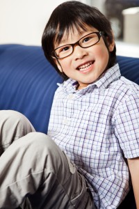 little Asian boy wearing glasses