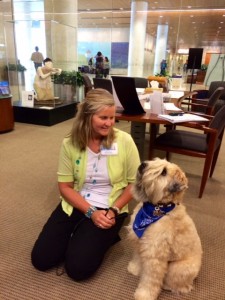Caring Canines Wheaten Terrier with owner at Mayo Clinic Cancer Center