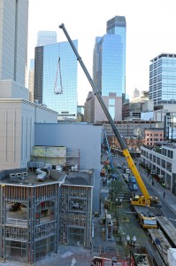 Crane delivering new MRI to Mayo Clinic Square in downtown Minneapolis. 