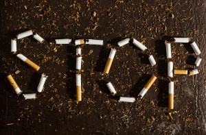 the word stop (smoking) spelled out with tobacco cigarettes