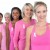 women dressed in pink shirts for breast cancer awareness