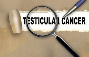 the words testicular cancer with a magnifying glass