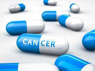 Ilustración de unas pastillas con la palabra cáncer