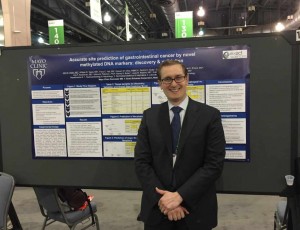 Dr. Kisiel at AACR meeting in front of his research poster