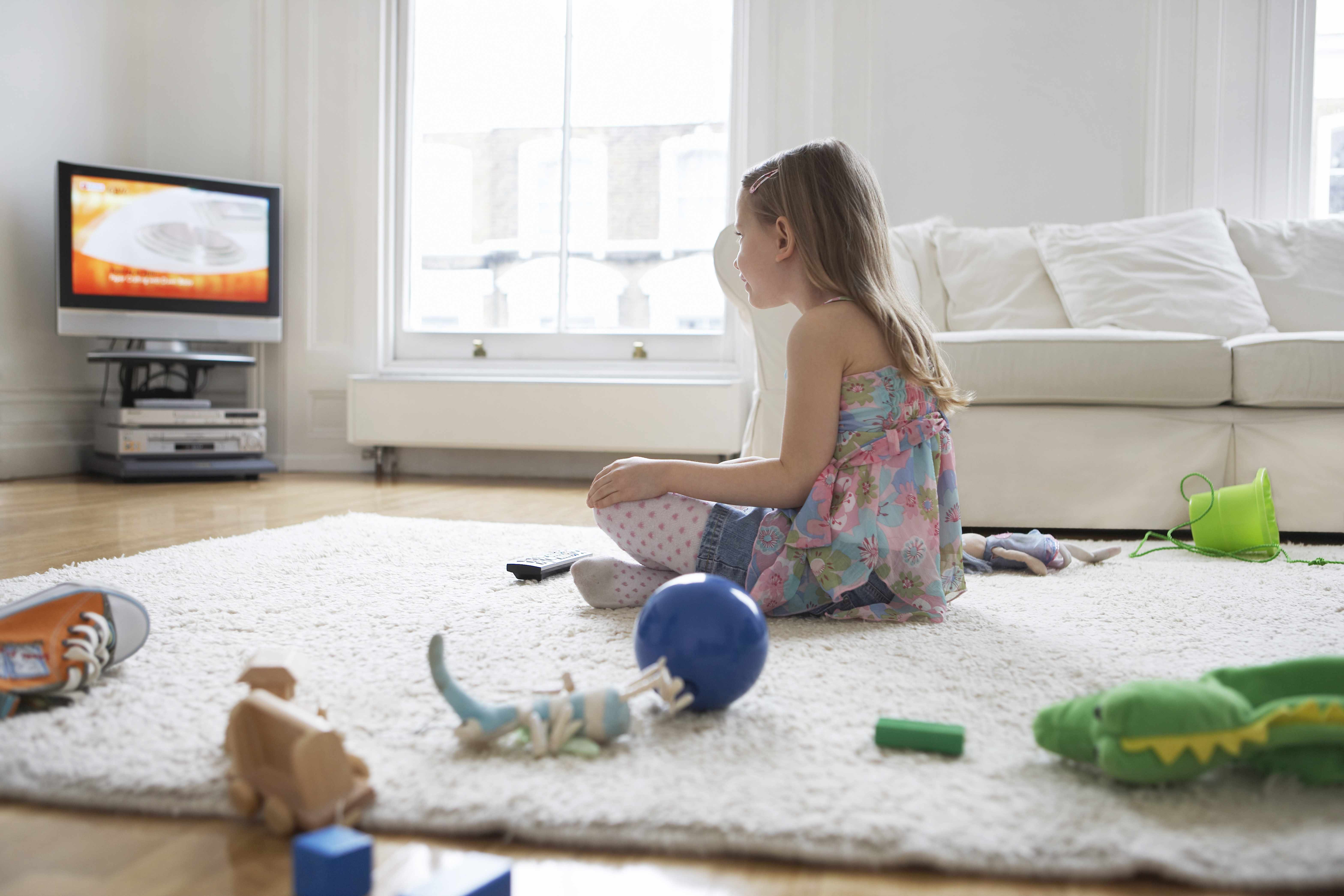 little girl staring at television screen, monitor