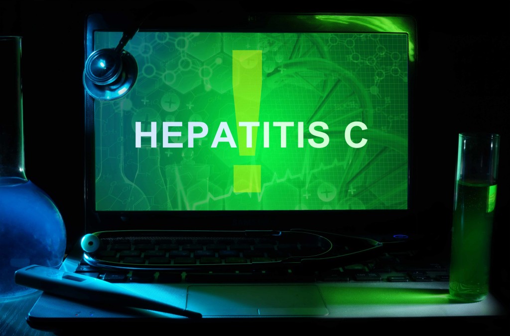 computer monitor screen with the sign Hepatitis C