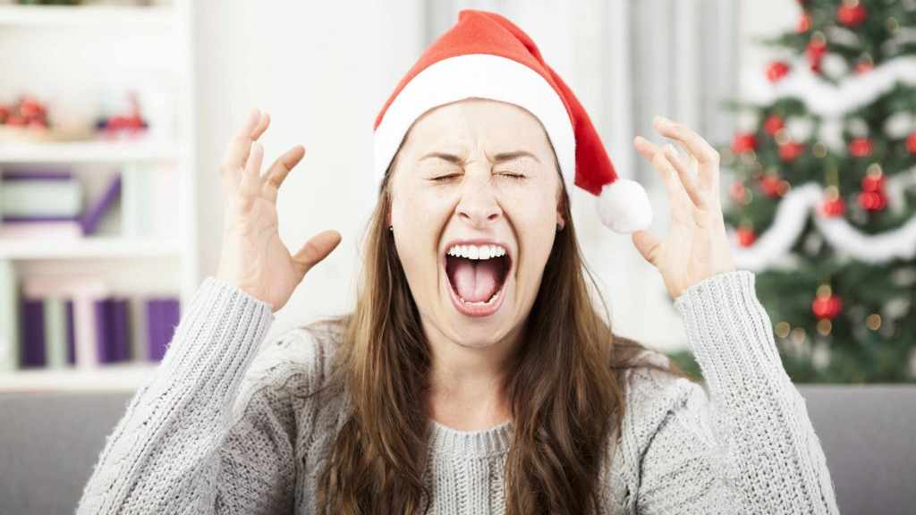 woman screaming due to holiday stress