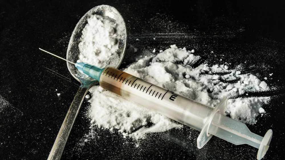 heroin needle syringe drugs
