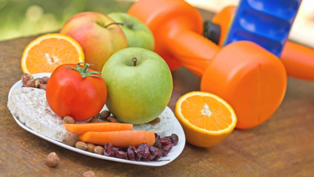 image of fruits, vegetables and hand weights representing healthy lifestyle