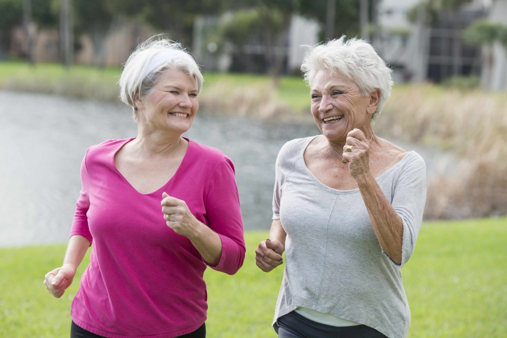 two older women exercising, running, jogging, walking