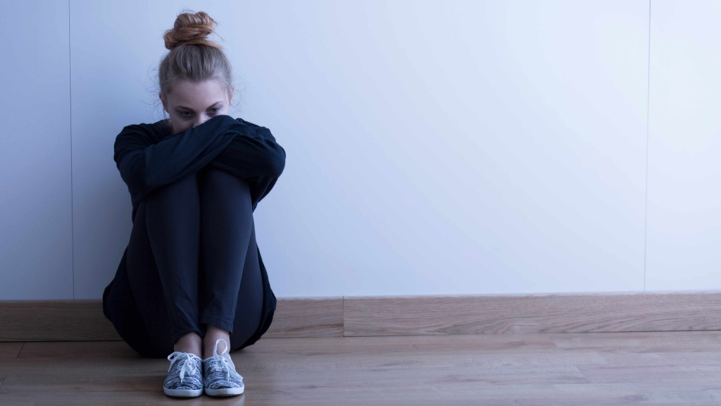 a teenage girl alone and looking sad, depressed