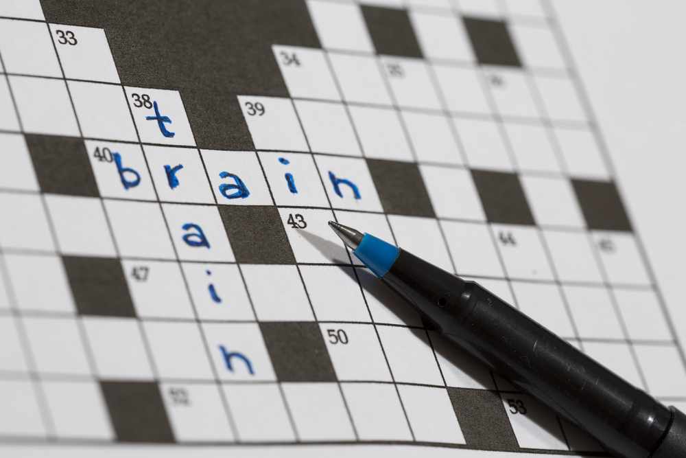 Crossword puzzle saying train and brain