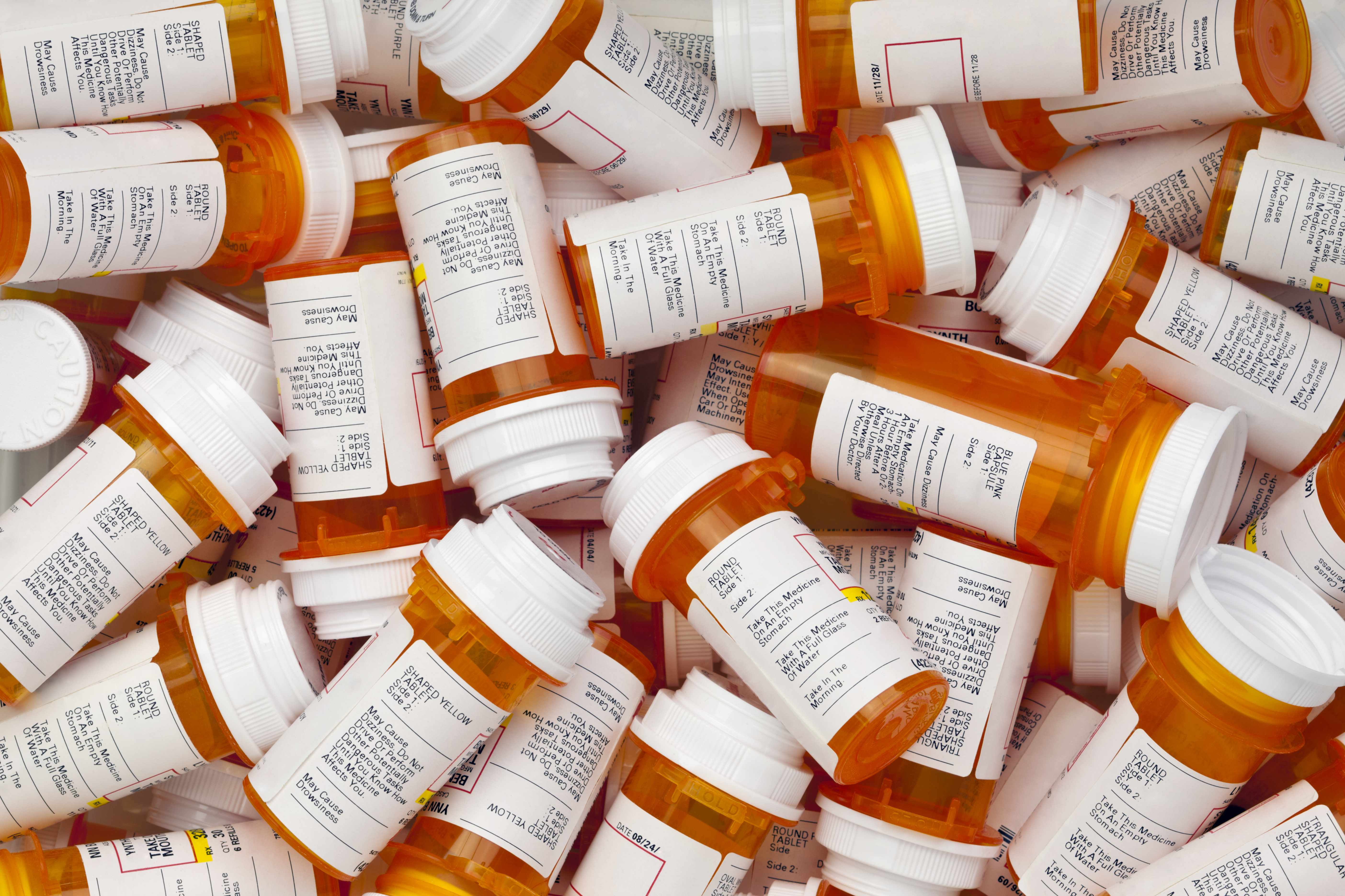 a collection of prescription pill bottles