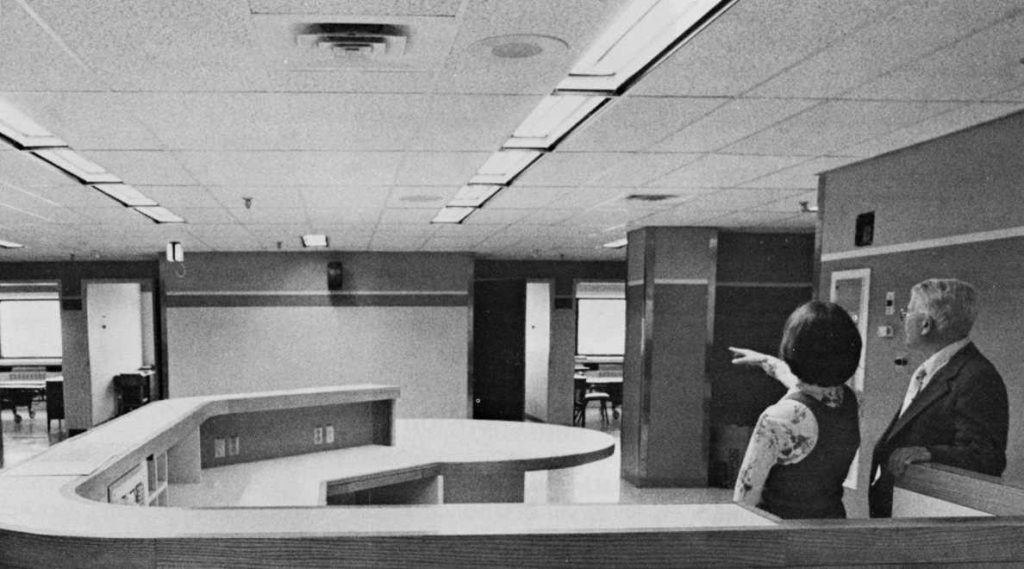 1980 St. Marys Hospital addition, Anne Monroe and Bill Cribbs inspect recently completed fifth floor medical-surgical nursing station