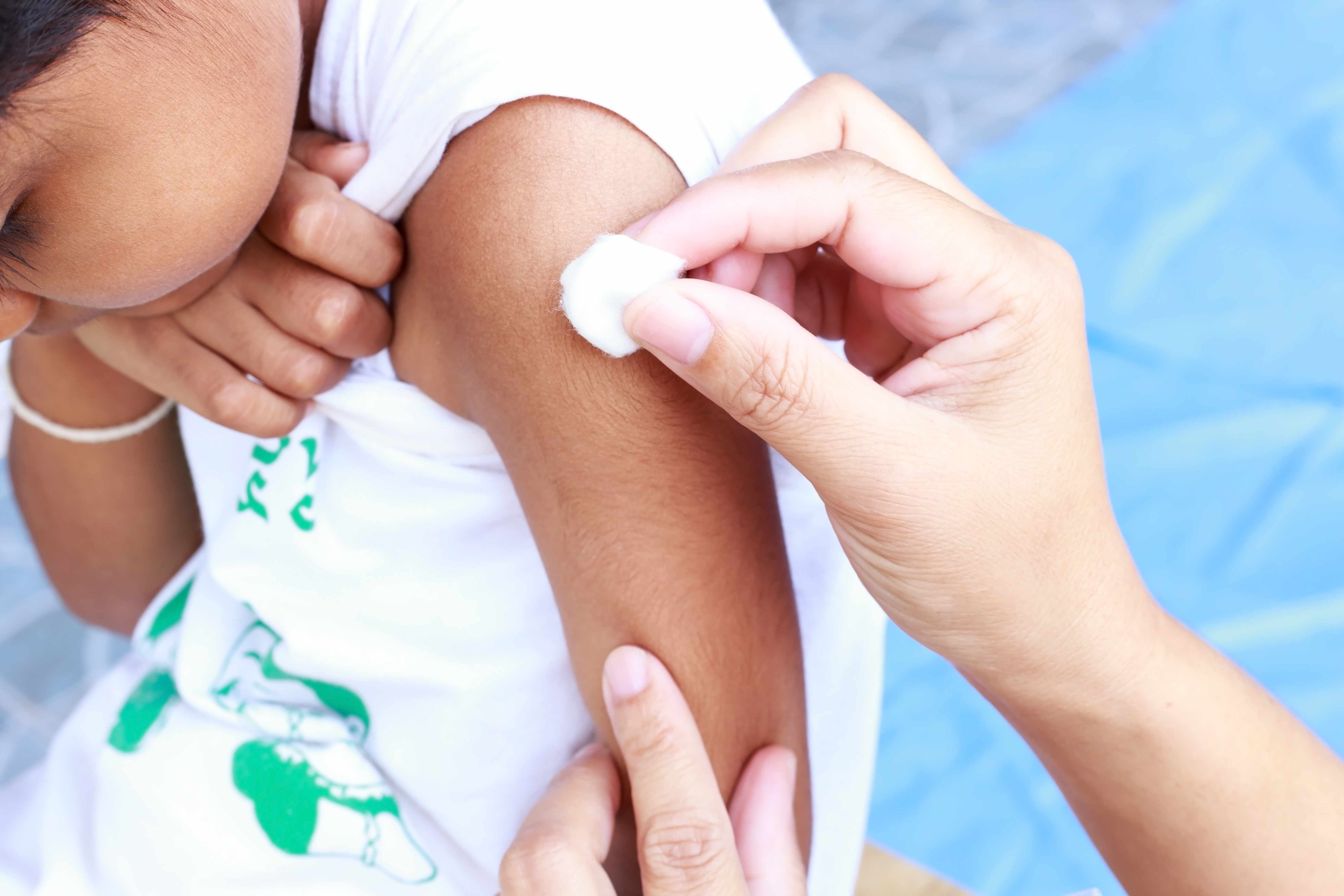 a child having just received a vaccination shot
