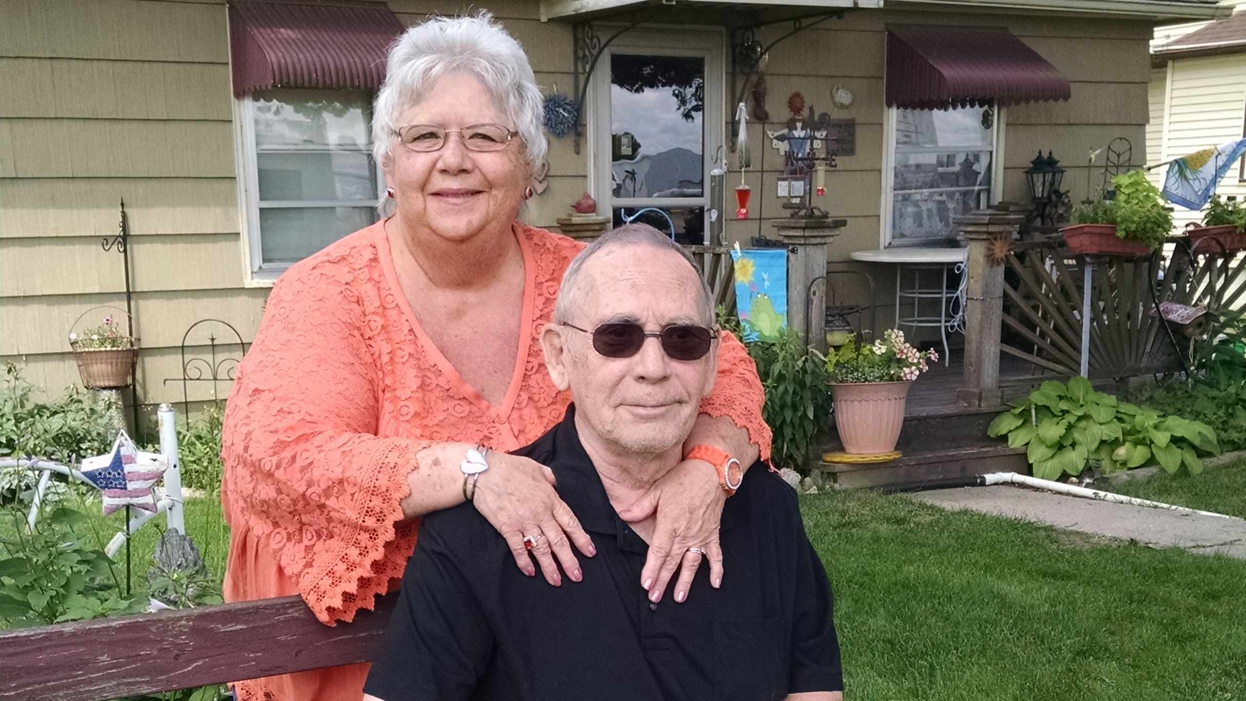aortic aneurysm patient pictured with his wife outside their home 16x9