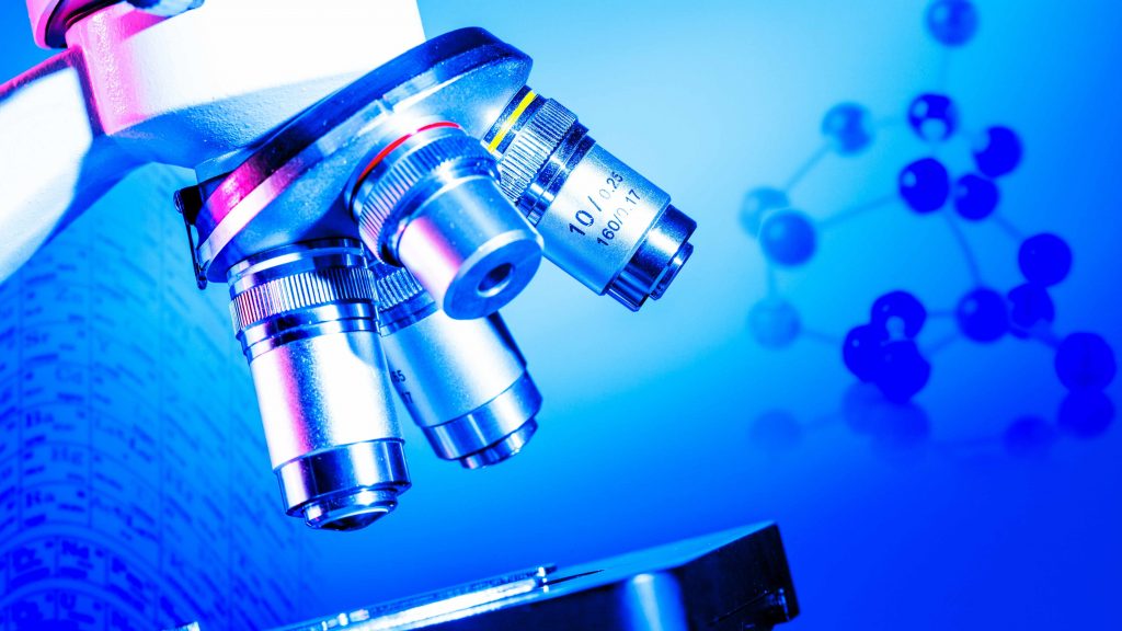 Trasfondo científico en medicina o química con un microscopio