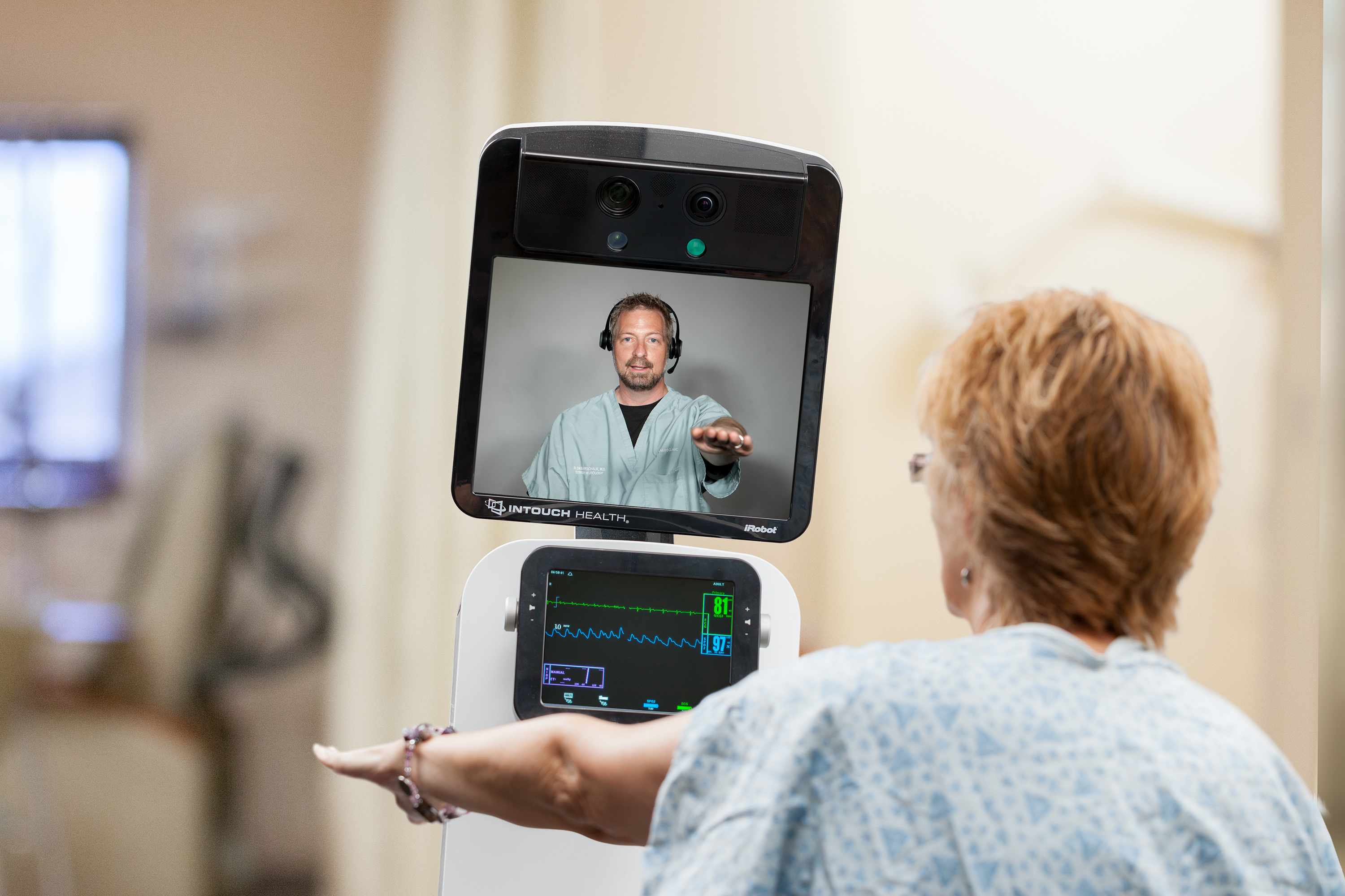 Patient looking at physician on telestroke machine