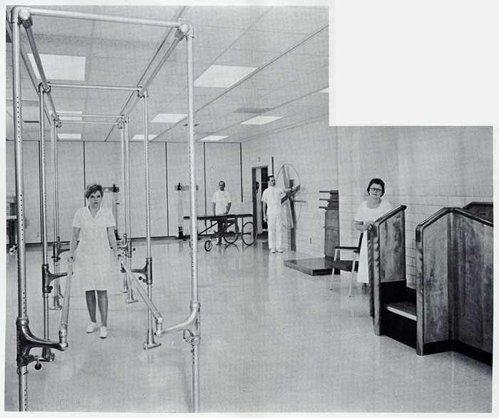 a 1967 photo of Janet Borg and Lucy Sivly, PT aides; Melvin Peterson, orderly; and Edwin Wessner, staff therapist in the gymnasium