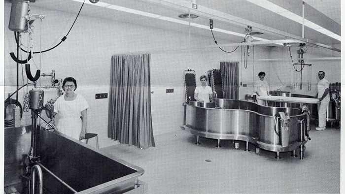 a 1967 photo of Lucy Sivly and Janet Borg, PT aides; Lorraine Jensen and Edwin Wessner, staff therapists; and walk-in tank and two Hubbard tanks for hydrotherapy