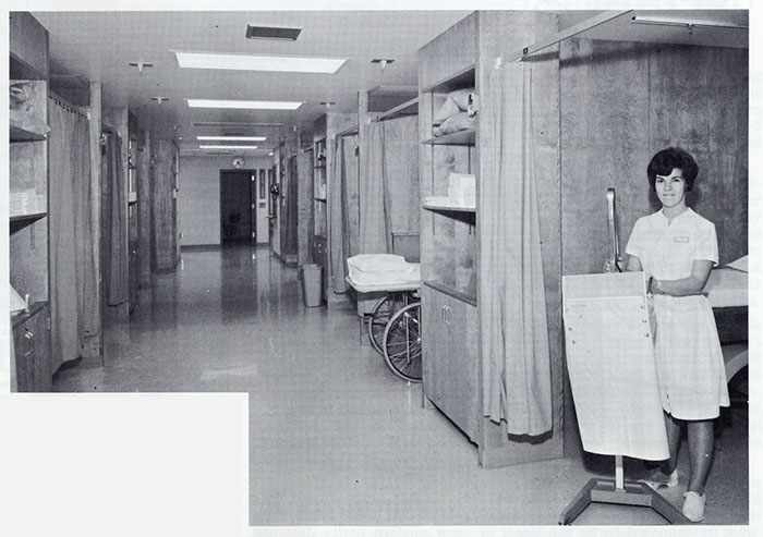 a 1967 photo of Physical Therapy senior student Genevieve McElroy in the treatment area