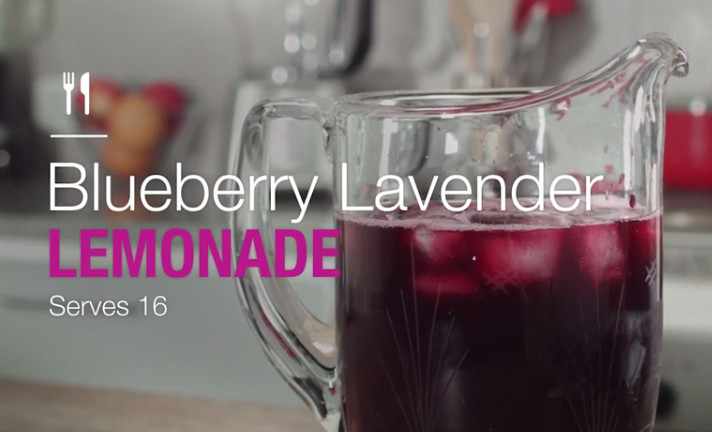 blueberry lavender lemonade in a glass pitcher