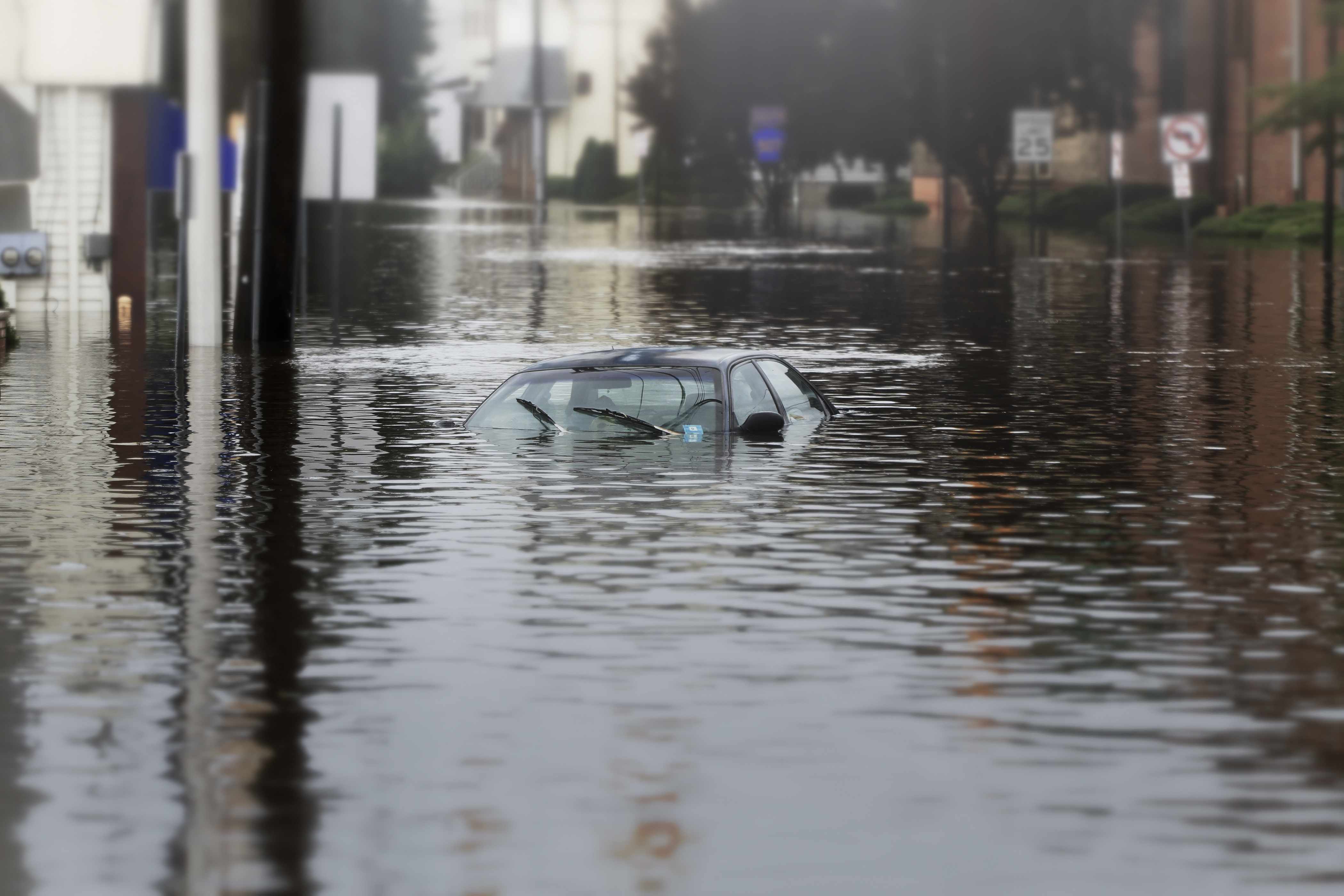 a car submerged in flood water