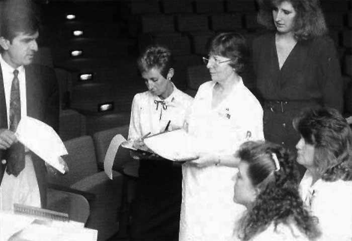 a 1990 photo of Abdul Bengali training (clockwise from left) Arlis Borgstrom, Marilyn Formichella, Tammy Schade, Karin Wallgren and Susan Vold on I-NET