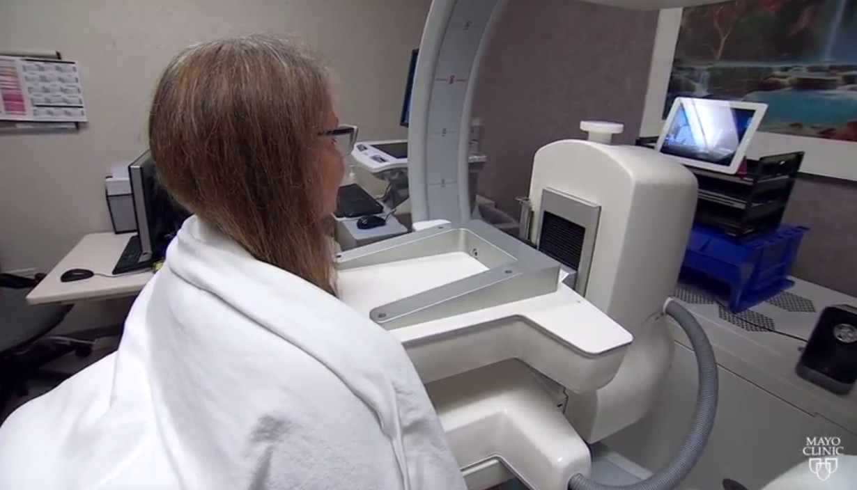 a patient having a breast cancer procedure called MBI - molecular breast imaging