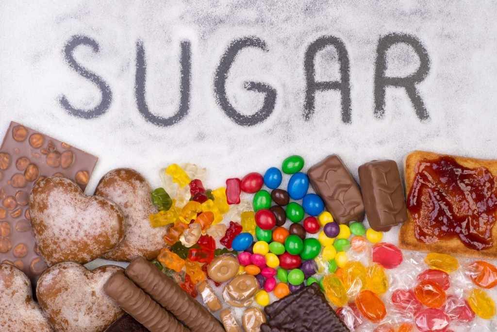 the word sugar written in sugar and candy