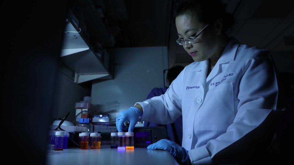 Dr. Betty Kim working with nanoparticles in her Florida lab.