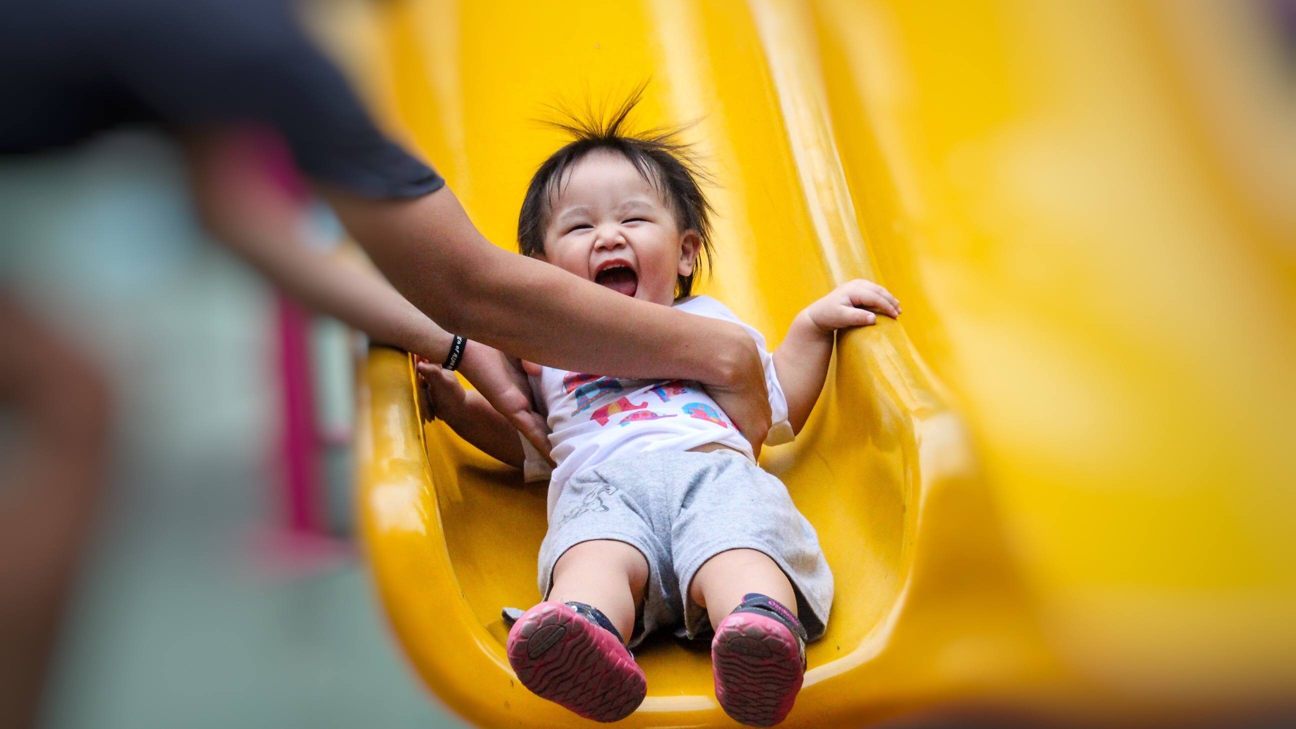 The Dangerous Link Between Sliding With A Toddler On The Lap And