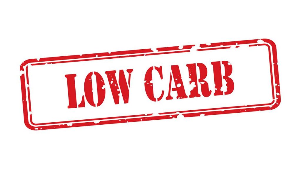a graphic of an ink stamped sign saying LOW CARB
