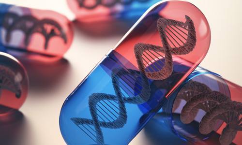 medicine capsules with DNA strand inside representing pharmacogenetics or pharmacogenomics