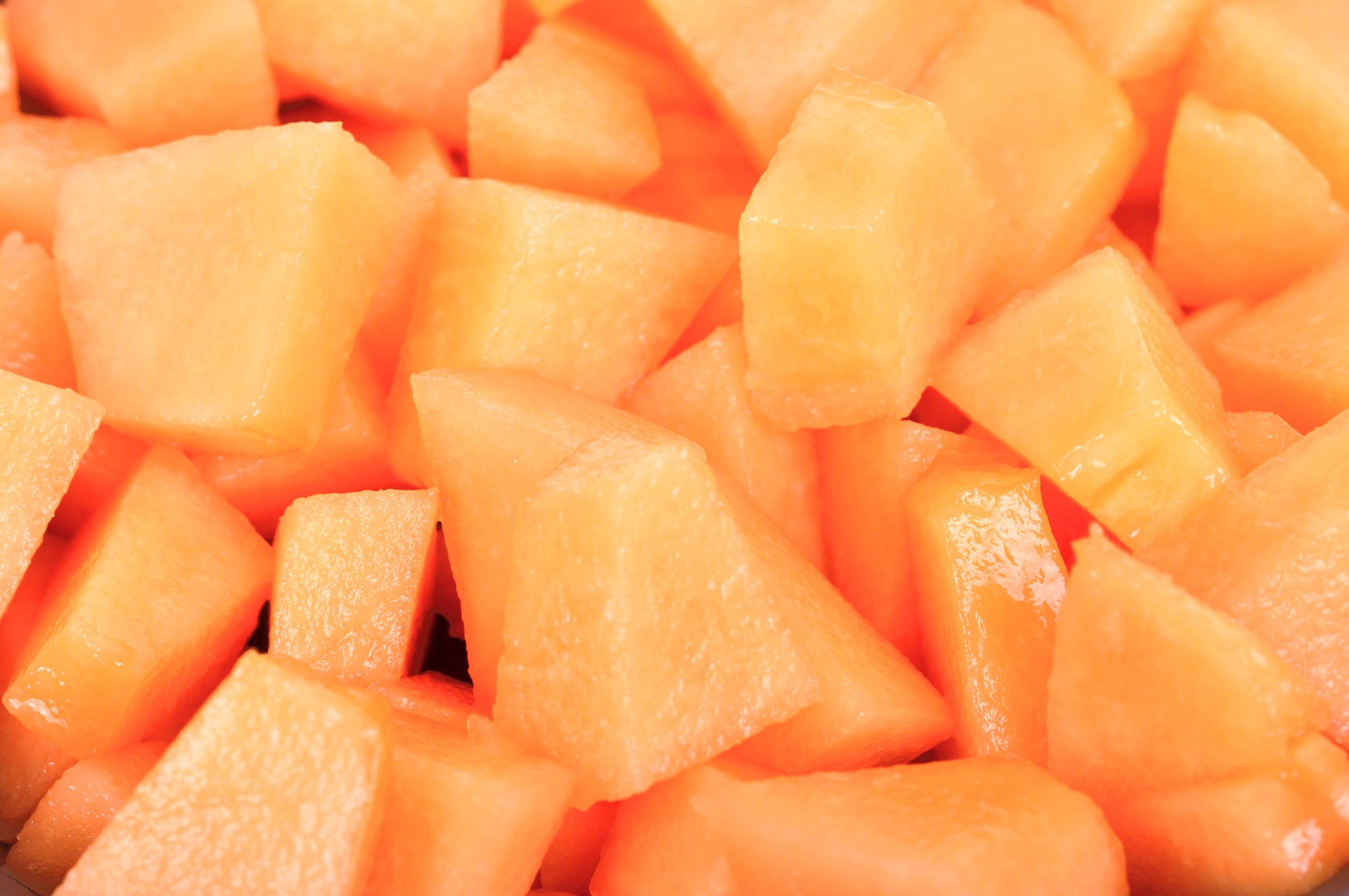 close up of chopped up and pre-cut melon, fruit