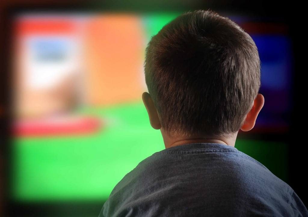 boy staring at television, screen time