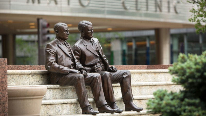 statues of Drs. Will and Charlie Mayo outside the entrance to the Mayo Clinic Gonda building