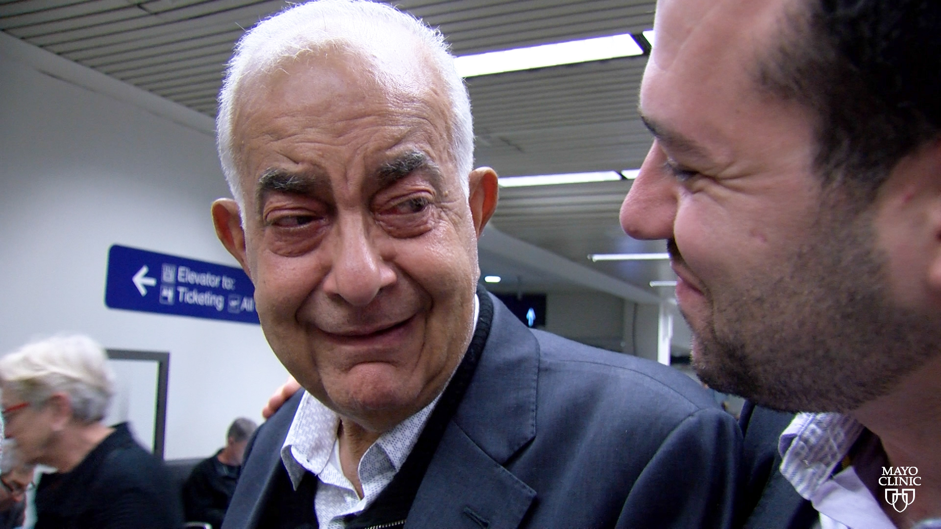 Dr. Fouad Chebib greeting his father at the airport
