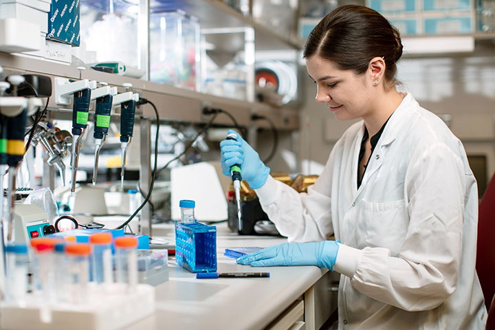 Biomedical researcher in laboratory