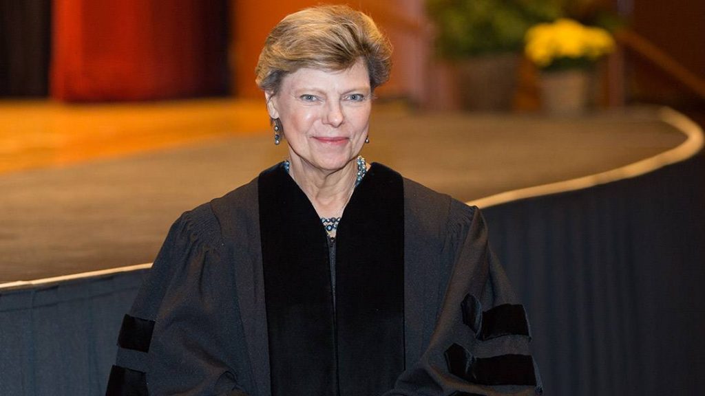 Cokie Roberts dressed in a commencement gown