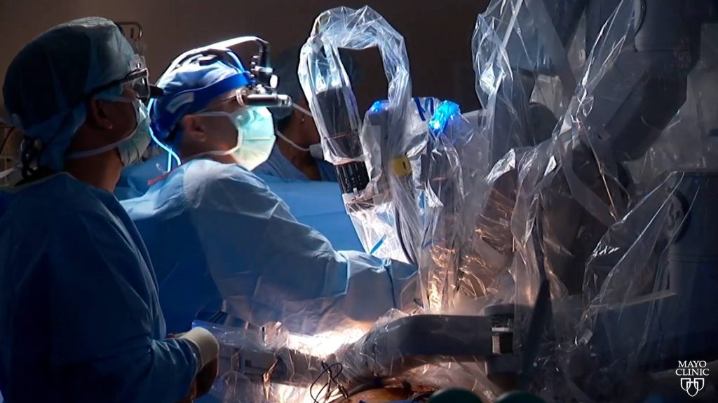 Mayo Clinic surgeons in the operating room performing robotic mitral valve surgery