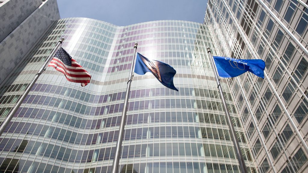Mayo Clinic Gonda Building windows with the U.S. flag, the Mayo Clinic flag and the Minnesota State flag flying outside