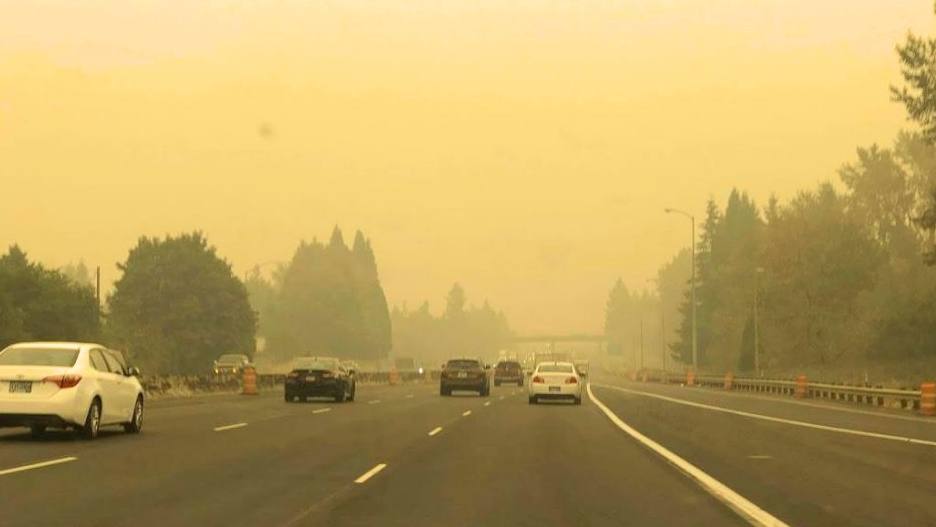 Wildfire smoke on across a highway in Oregon
