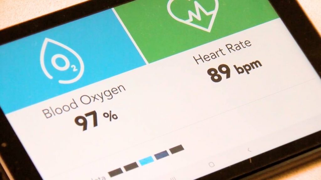 a close up of the screen for the monitoring tool that helps patients at home take their vital symptoms